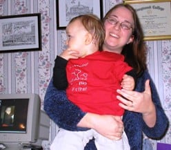Mom holding son