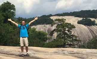 Alex Schenker writer for Earth's Friends Alex Schenker hiking Stone Mountain, NC