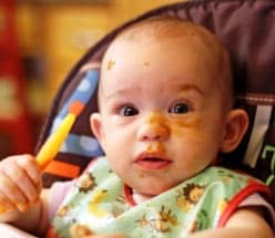 Baby food on baby's face