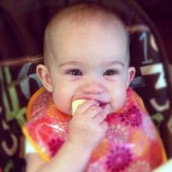 Baby eating cookie
