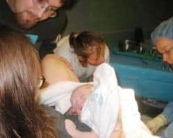 Mom after birth with new baby