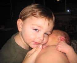 Newborn baby with big brother