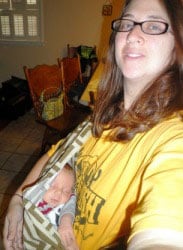 Mom with Seven Sling baby carrier 