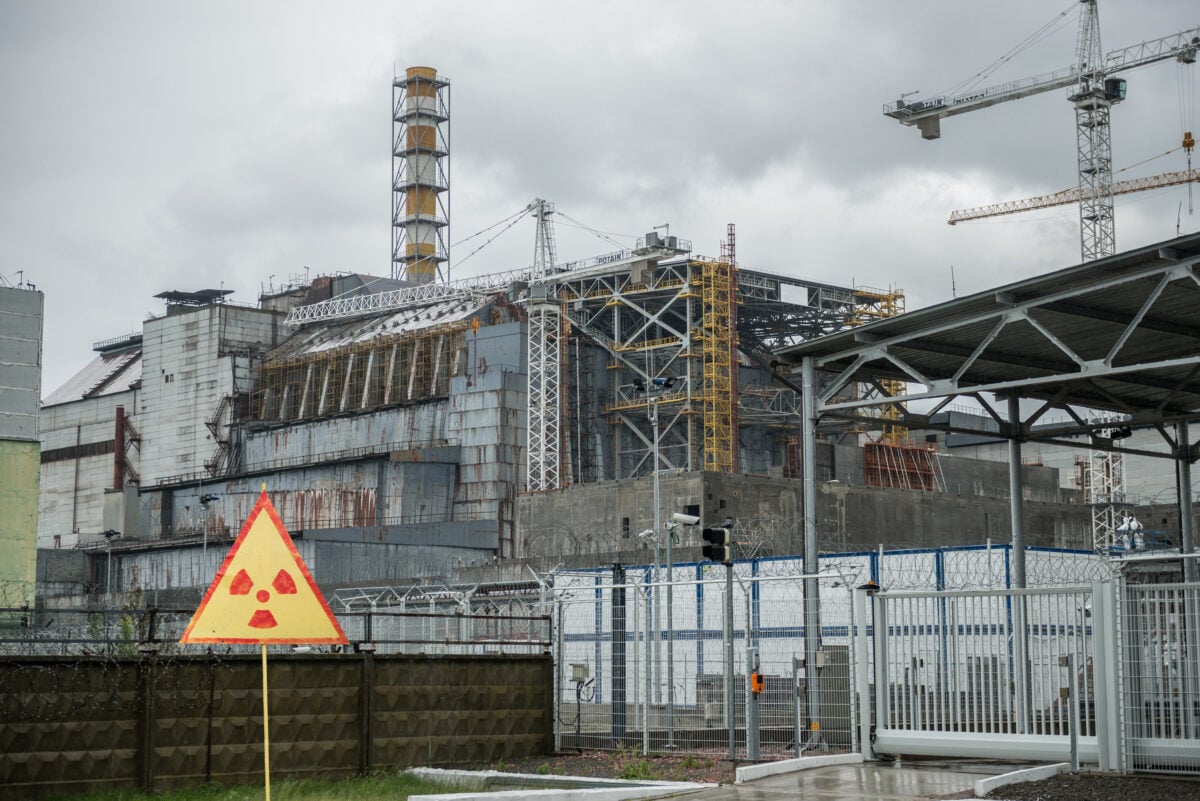 Chernobyl power station, 4-th block, with sign depicting radiation warning.