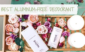 Native Cos in bath tub with flowrs and candles (caption: Aluminum Free Deodorant)