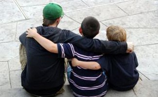 Boys hugging