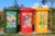 compost waste recycling colored bins, photo by Nareeta Margin, licensed via Unsplash