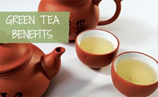 Pot and cups of green tea