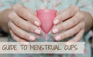 Girl holding menstrual cup: Guide to Best Menstrual Cups
