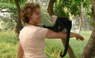 Person with primate on arm