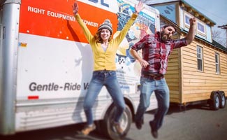 Christian and Aexis of Tiny House Expedition jumping