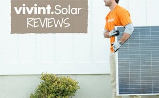 Installer carrying Vivint Solar pannel: Vivint Solar Reviews